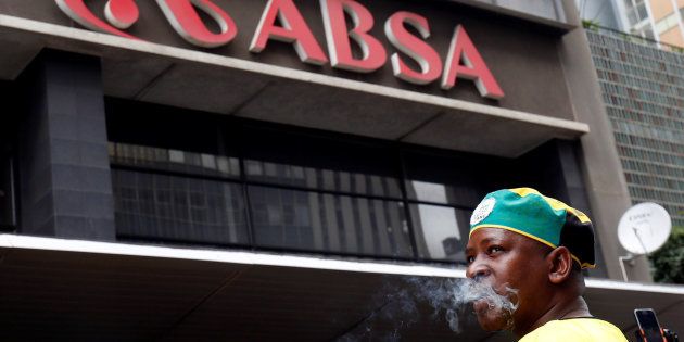 A member of the African National Congress Youth League protests in front of ABSA Bank against what they say is the bank benefitting from an apartheid-era bailout, in Durban, South Africa January 26, 2017.