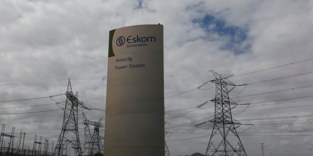 Pylons carry electricity from a substation of state power utility Eskom outside Cape Town in this picture taken March 20, 2016.