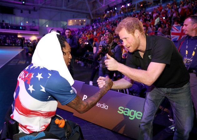 Prince Harry congratulates the US team at the Wheelchair Basketball Finals during the 2017 Invictus Games.
