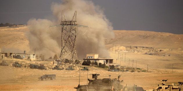 Smoke rises next to a position held by the Iraqi rapid response forces during a battle against Islamic State militants in the south of Mosul, Iraq February 19, 2017.