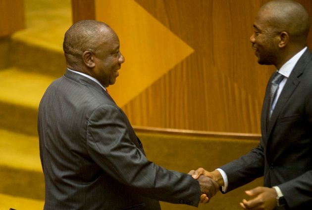 Cyril Ramaphosa is congratulated by DA leader Mmusi Maimane after being sworn in as the new president of the Republic of South Africa in Parliament on February 15, 2018 in Cape Town.