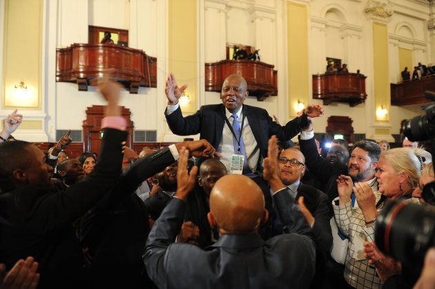 The DA's Herman Mashaba being carried on the shoulders of supporters after he was elected mayor of Johannesburg on 22 August 2016.