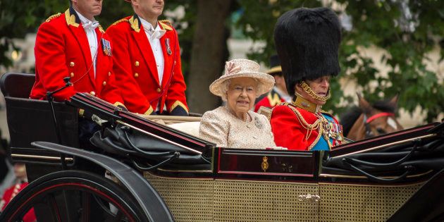 London, England - June 13, 2015: Queen Elizabeth II in an open carriage with Prince Philip for trooping the colour 2015 to mark the Queens official birthday, London, UK