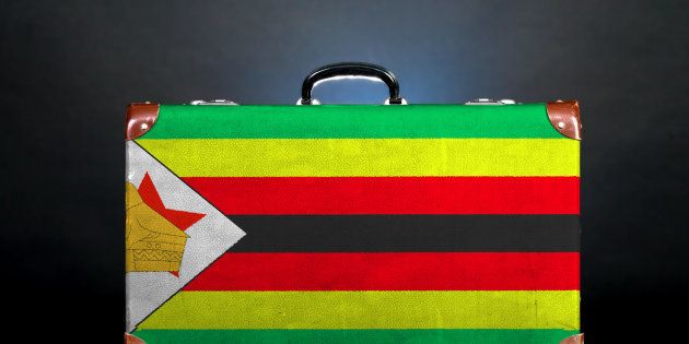 The Zimbabwe flag on a suitcase.