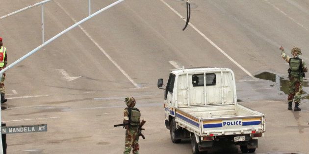 Soldiers stand on the streets in Harare, Zimbabwe, November 15, 2017.