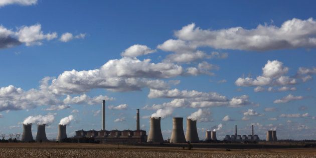 Steam rises from the cooling towers of Matla Power Station, a coal-fired power plant operated by Eskom in Mpumalanga province, South Africa, May 20, 2018.