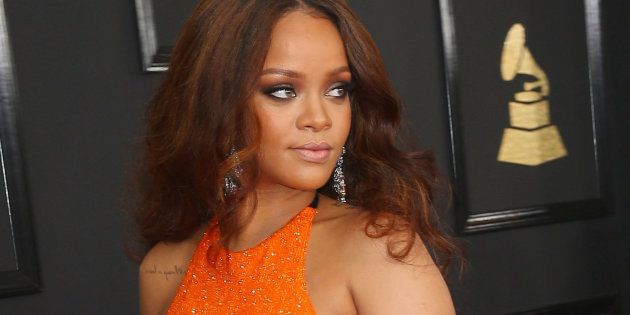 LOS ANGELES, CA - FEBRUARY 12: Recording artist Rihanna attends The 59th GRAMMY Awards at STAPLES Center on February 12, 2017 in Los Angeles, California. (Photo by Joe Scarnici/Getty Images for FIJI Water)