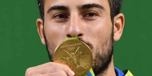Iranian weightlifter Kianoush Rostami won gold at the Summer Olympics in Rio last year.