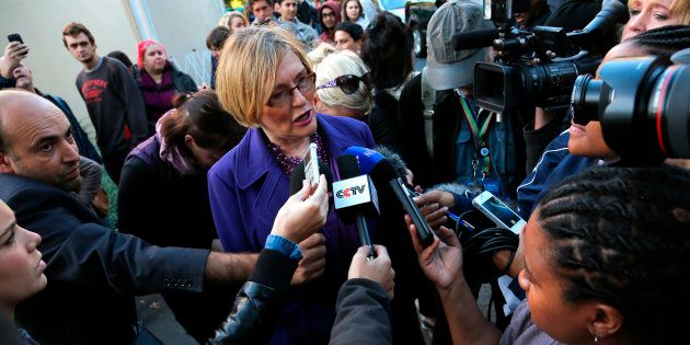 Helen Zille (C) speaks to the media before casting her vote in Rondebosch, Cape Town, May 7, 2014.