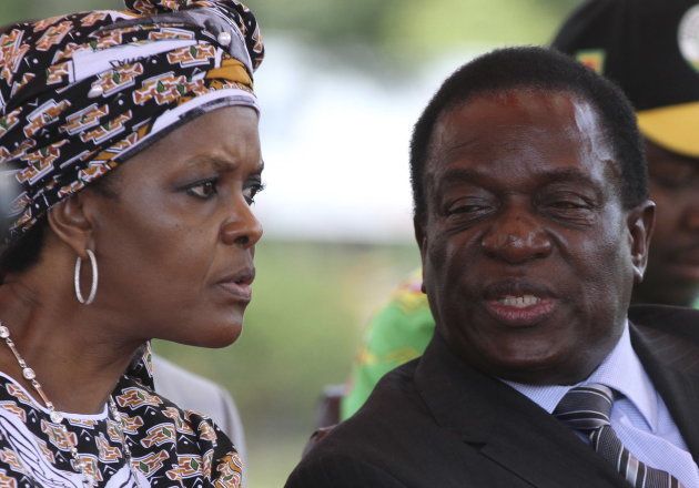 Zimbabwe's President Robert Mugabe's wife Grace talks to ex-Vice President Emmerson Mnangagwa at a gathering of the ZANU-PF party's top decision making body, the Politburo, in the capital Harare, February 10, 2016.