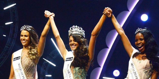 Demi-Leigh Nel-Peters flanked by Boipelo Mabe and Ade Van Heerden during the crowning of Miss SA 2017 beauty pageant at Sun City.