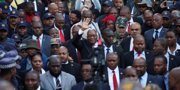 Jacob Zuma waves to supporters outside the High Court in Durban, June 8 2018.