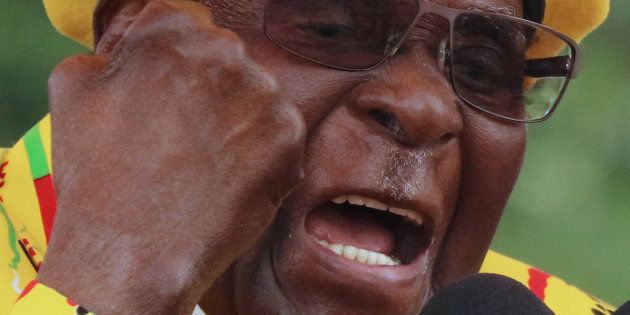 President Robert Mugabe gestures as he addresses a rally in Harare, Zimbabwe, November 8,2017.