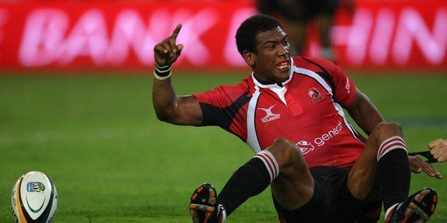 Ashwin Willemse celebrates after scoring his try during the round-two Super 14 match between the Sharks and the Lions at ABSA Stadium on February 21 2009, in Durban.