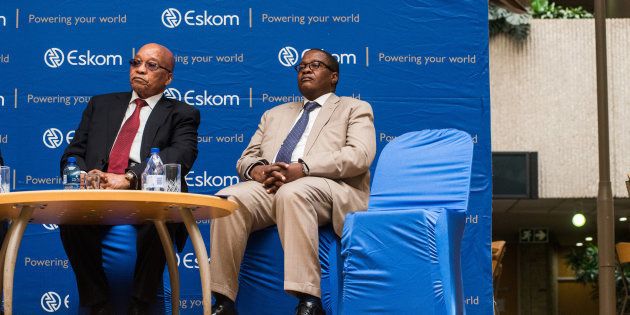 Jacob Zuma, South Africa's president, left, and Brian Molefe, chief executive officer of Eskom Holdings SOC Ltd., sit on the podium during speeches at the headquarters of Eskom Holdings SOC Ltd. at Megawatt Park
