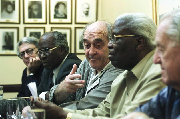 Lionel Bernstein, Andrew Mlangeni, Dennis Goldberg (C), Raymond Mhlaba and Arthur Goldreich (R) address members of the media, at Rivonia Liliesleaf farm in Johannesburg December 15 2001. More than a generation after they were sent to die in prison alongside Nelson Mandela, the handful of South Africans celebrated victory on Saturday in their struggle against white rule. The 1963-64 Rivonia treason trial, where Mandela delivered his famous 'I am prepared to die' speech from the dock, sentenced eight anti-apartheid activists including the former president to life behind bars.