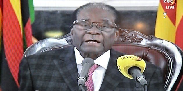 This photograph taken on November 19, 2017, shows a television broadcasting Zimbabwe's President Robert Mugabe delivering a speech in Harare, following a meeting with army chiefs who have seized power in Zimbabwe.