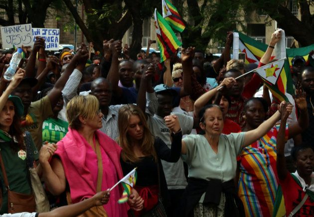 Residents attend a prayer meeting called to celebrate after Zimbabwean President Robert Mugabe was dismissed as party leader of the ruling ZANU-PF's central committee in Harare, Zimbabwe, November 19, 2017.