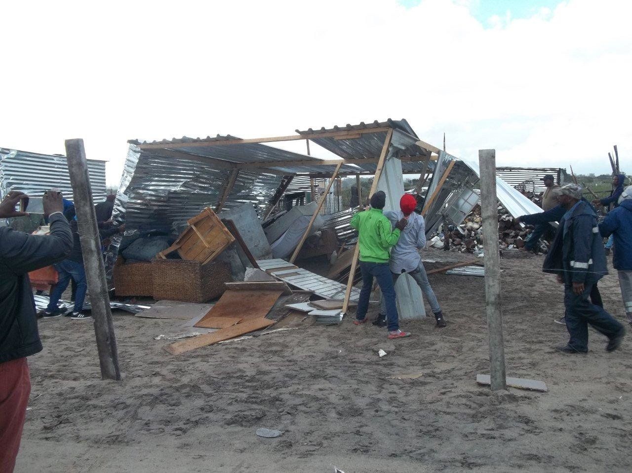 Residents of Khayalitsha destroyed a shack on Saturday, June 9 2018, and then stole the contents and building materials. The shack housed a shop run by a South African woman and her Congolese husband.