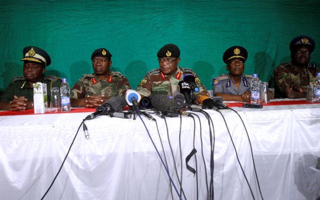 Commander of Zimbabwe Defence Forces General Costantino Chiwenga (C) addresses the media with other security chiefs in Harare, Zimbabwe November 20, 2017.
