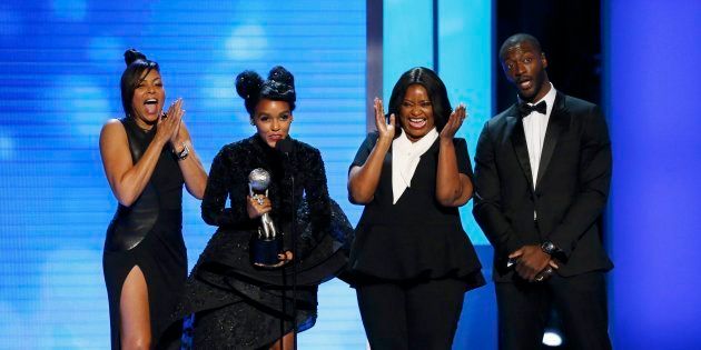 Actors Taraji P. Henson, Janelle Monae and Octavia Spencer accept the award for Outstanding Motion Picture for