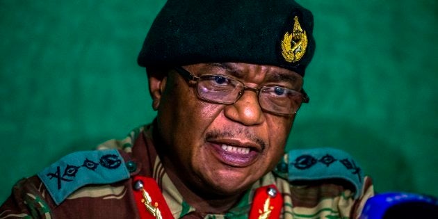 Zimbabwe's Commander Defense Forces General Constatntino Guveya Chiwenga (C) speaks during a press conference at the Tongogara Barracks on November 20, 2017 in Harare, Zimbabwe.