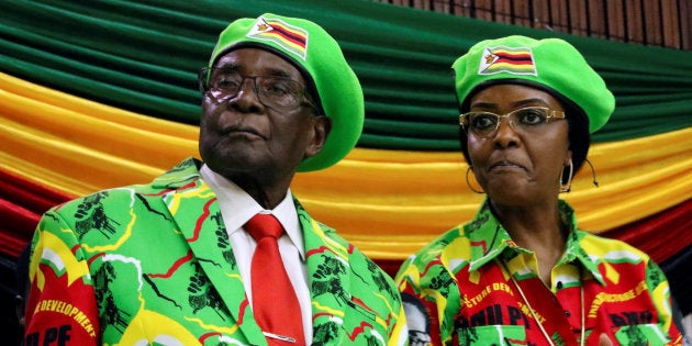 Zimbabwean President Robert Mugabe and his wife Grace attend a meeting of his ruling ZANU PF party's youth league in Harare, Zimbabwe, October 7, 2017.