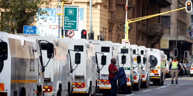A cash-in-transit worker arrives to attend a nationwide protest following a spate of deadly heists this year, in Johannesburg, South Africa, June 12, 2018. REUTERS/Siphiwe Sibeko