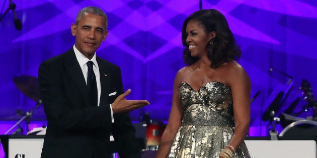 President Barack Obama and First Lady Michelle Obama arrive to address the Congressional Black Caucus Foundation's 46th Annual Legislative Conference Phoenix Awards Dinner, September 17 2016, in Washington, DC.