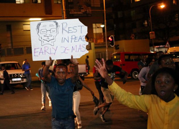 Zimbabweans living in South Africa celebrate after President Robert Mugabe resigns, in Johannesburg, South Africa November 21, 2017.