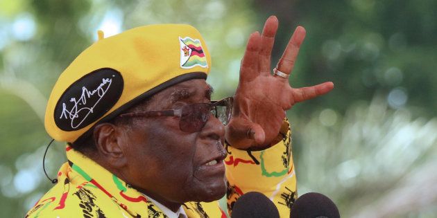 President Robert Mugabe gestures as he addresses a rally in Harare, Zimbabwe, November 8, 2017.
