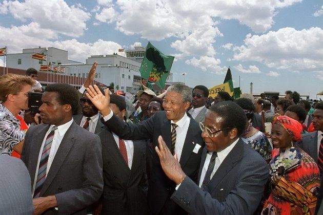 Nelson Mandela visits Harare and is welcomed by then Zimbabwean president Robert Mugabe weeks after he was released from prison in March 1990.