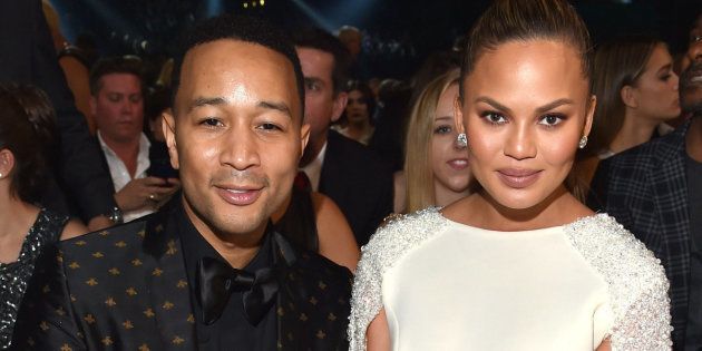 LOS ANGELES, CA - FEBRUARY 15: Singer John Legend and model Chrissy Tiegen attend The 58th GRAMMY Awards at Staples Center on February 15, 2016 in Los Angeles, California. (Photo by Lester Cohen/WireImage)