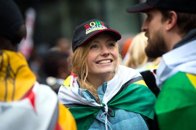 Zimbabweans gather outside the Zimbabwe Embassy in London, to demonstrate in support of the ousting of President Robert Mugabe.