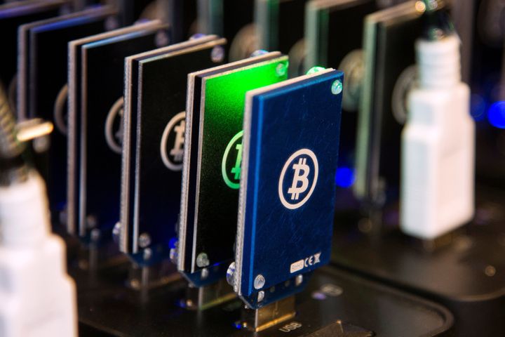 FILE PHOTO - A chain of block erupters used for Bitcoin mining is pictured at the Plug and Play Tech Center in Sunnyvale, California October 28, 2013. To match Special Report BITCOIN-WRIGHT/PATENTS REUTERS/Stephen Lam/File Photo