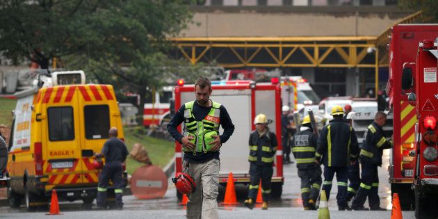 An emergency worker is seen after a roof collapsed at Johannesburg's Charlotte Maxeke state hospital in Johannesburg, South Africa, March 2, 2017.