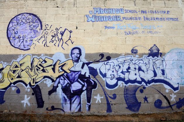 Mural painting of Hector Pieterson, who was killed on June 16 1976, at the age of 13, when police opened fire on protesting students in Soweto.