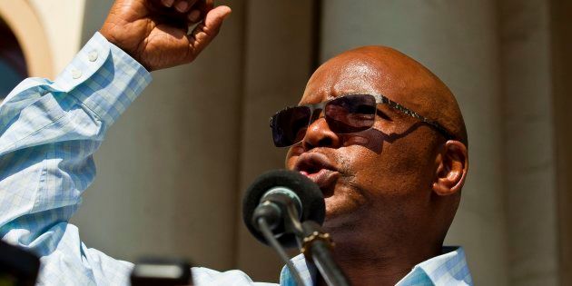 Businessman and chairperson of the Save South Africa (SaveSA) movement Sipho Pityana addresses a crowd of supporters of the SaveSA campaign on April 4, 2017.