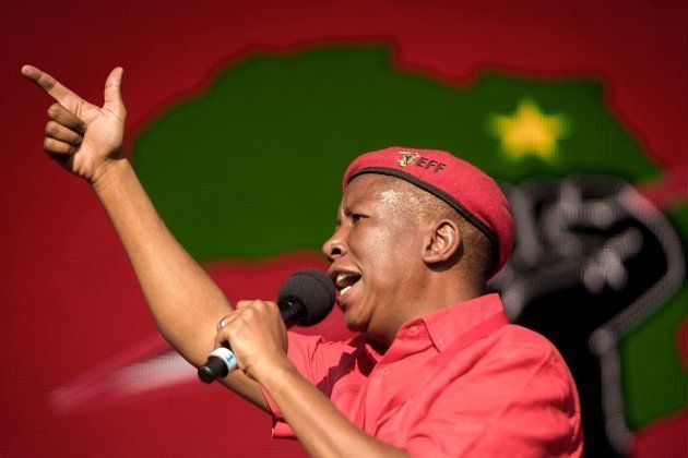 Leader of the South African radical-left opposition party Economic Freedom Fighters (EFF), Julius Malema delivers a speech during a mass rally marking the party's fourth anniversary on July 29, 2017 at the Curries Fountain Stadium in Durban. / AFP PHOTO / RAJESH JANTILAL (Photo credit should read RAJESH JANTILAL/AFP/Getty Images)