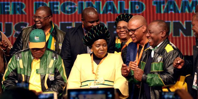 South Africa's President Jacob Zuma dances with former African Union chairperson Nkosazana Dlamini-Zuma and South Africa's Deputy President Cyril Ramaphosa during the last day of the six-day meeting of the African National Congress 5th National Policy Conference at the Nasrec Expo Centre in Soweto, South Africa, July 5, 2017.