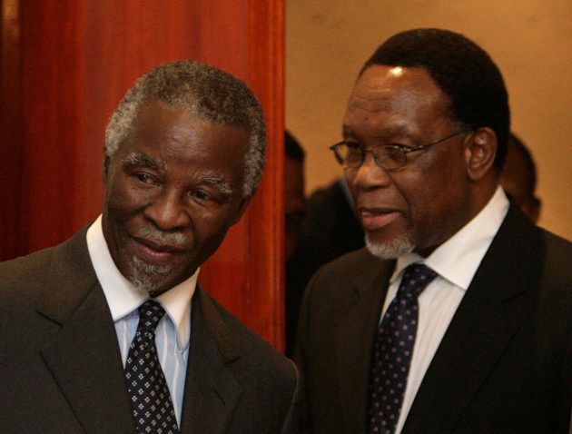 Former South African presidents Thabo Mbeki (L) and Kgalema Motlanthe