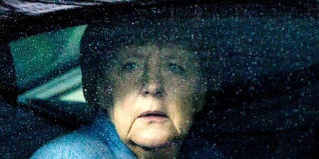 German Chancellor Angela Merkel waits in her car as she arrives to attend the Eastern Partnership summit at the European Council Headquarters in Brussels, Belgium, November 24, 2017. REUTERS/Virginia Mayo/Pool