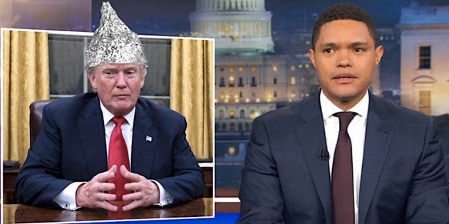 Trevor Noah, right, and his make-believe tinfoil-hatted president.