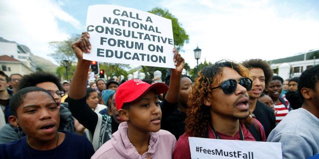 University students and staff protest against fee increases at tertiary educational institutions outside Parliament in Cape Town, South Africa September 22, 2016. REUTERS/Mike Hutchings