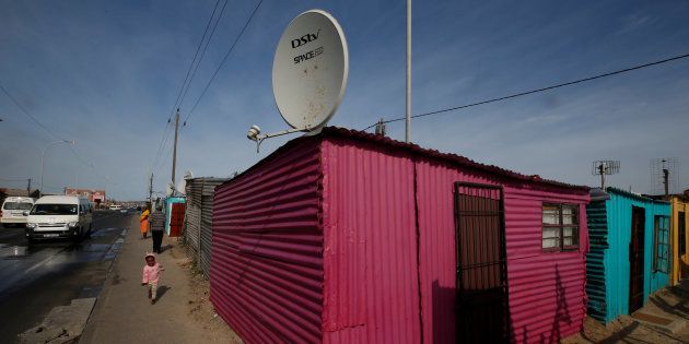A DStv satellite dish in Khayelitsha township, Cape Town, May 25, 2017. DStv belongs to MultiChoice, a Naspers company.