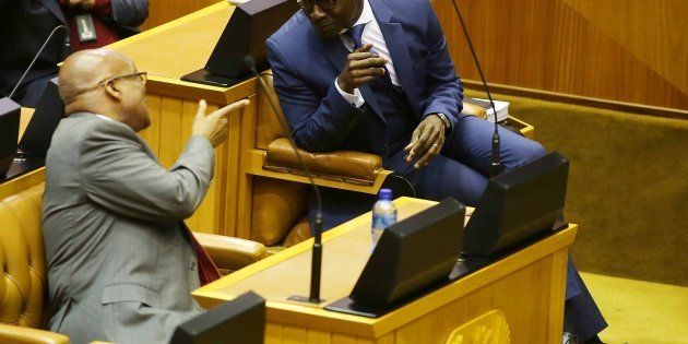 President Jacob Zuma shares a word with Finance Minister Malusi Gigaba during the mid-term budget speech in Parliament on October 25, 2017.