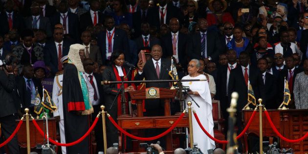 Kenya's President Uhuru Kenyatta takes oath of office during inauguration ceremony at Kasarani Stadium in Nairobi, Kenya November 28, 2017.