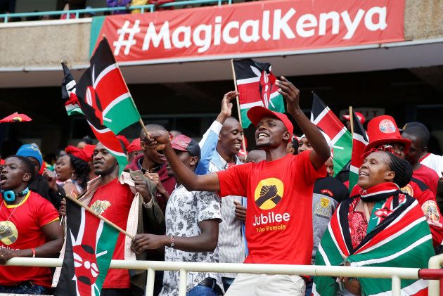 People cheer as they wait for the inauguration ceremony to swear in Kenya President Uhuru Kenyatta at Kasarani Stadium in Nairobi, Kenya November 28, 2017.