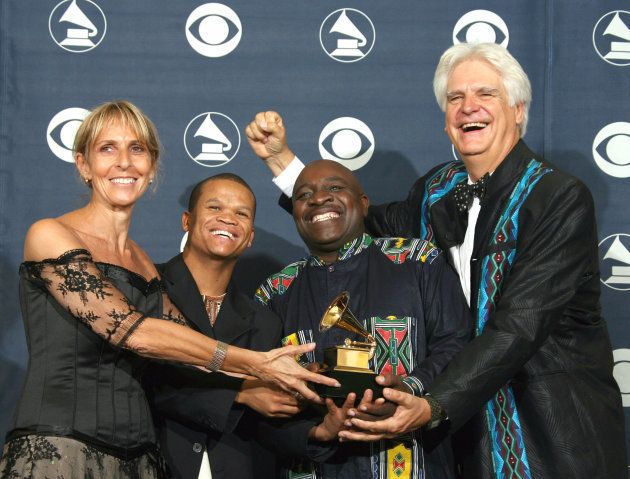 Los Angeles, UNITED STATES: Winners of Traditional World Music Album, the Soweto Gospel Choir pose with their trophy at the 49th Grammy Awards in Los Angeles 11 February 2007. AFP PHOTO/Gabriel BOUYS (Photo credit should read GABRIEL BOUYS/AFP/Getty Images)