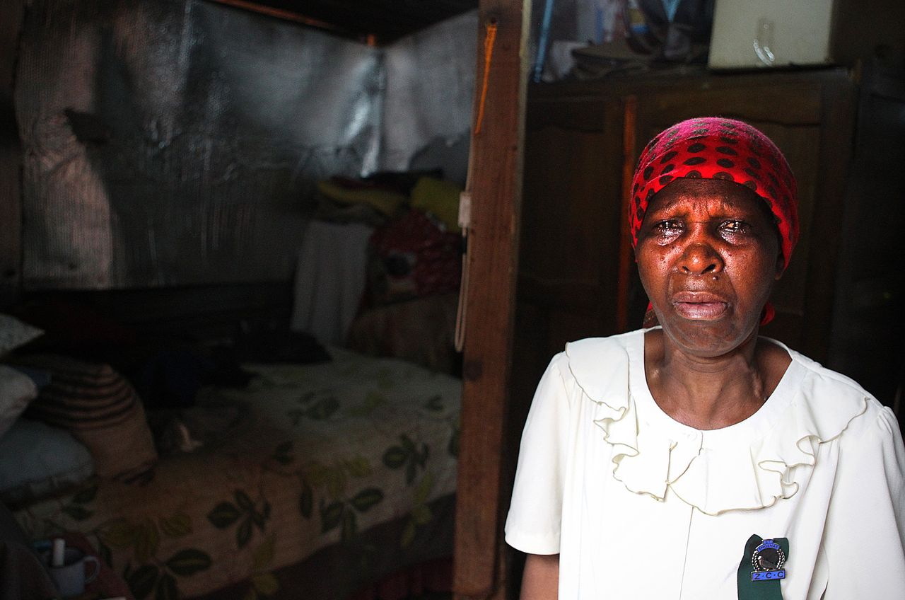 A visibly distraught Johanna Thubakgale in her one-room house in Winnie Mandela Park